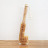Eco Beige curved natural coconut bottle brush with wood handle. Used for cleaning bottles.