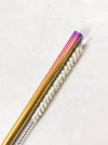 Multicolor stainless steel straw with natural sisal straw brush set in white background.