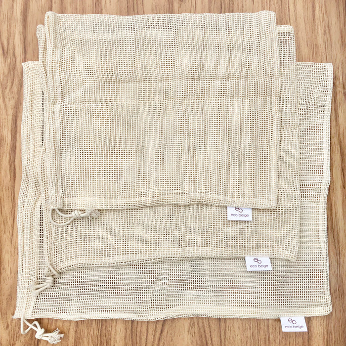 Eco Beige Natural Produce Bags set of 3 flat lay top view. Sizes: 25x30cm/30x32cm/32x40cm