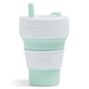 Mint color Stojo cup in 16oz. Front view in white background.