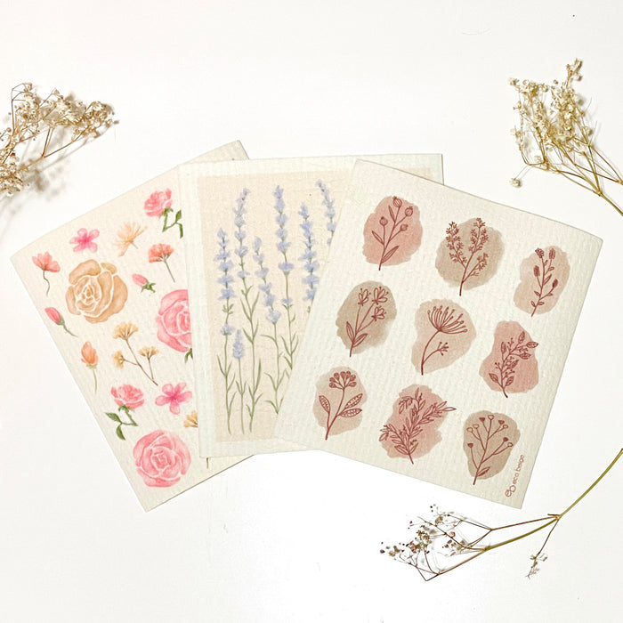 A bundle of 3 beautiful flower design sponge cloths; Lavender, Rose, and Botanicals.  Sponge cloth is one of the most incredible and eco-friendly house cleaning tool. It replaces up to 17 paper towel rolls, preventing lots of single-use waste in the household. The cloth is also super absorbent, great for picking up liquid spill. It is machine washable and dries super quickly leaving no odor behind!