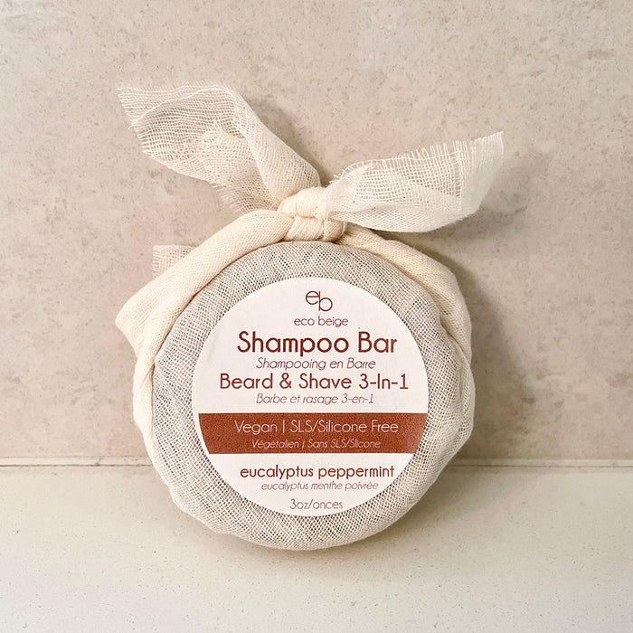 Eco Beige coca color shampoo bar beard and shave 3-in-1 in eucalyptus peppermint scent. Wrapped in cotton gauze. Locally made in Vancouver.
