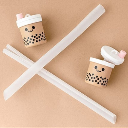 Boba Tribe cute bubble tea keychain silicone straw holder. Poke a hole cap and roll up ziplock silicone straw in a keychain case. Reusable, portable, sustainable.