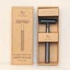 Matted black gold zinc alloy safety razor in kraft box packaging.