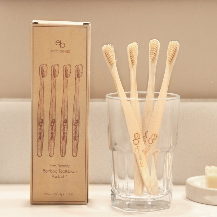 4 eco-friendly bamboo toothbrush with Eco Beige engraved. Kraft box packaging with toothbrush sketch illustration.