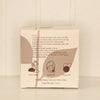 Charcoal Konjac Sponge in recyclable paper box. with info graphic use of instructions.