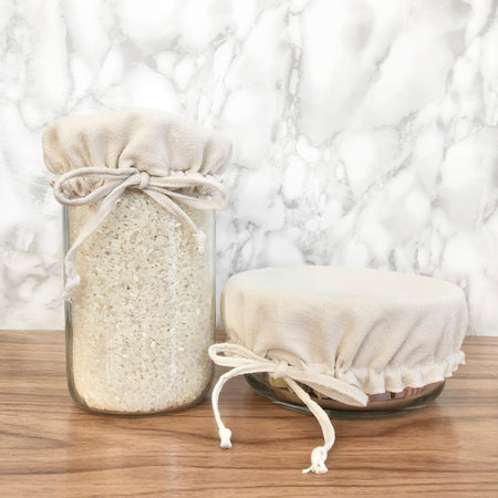 Eco Beige handmade linen covers wrapped and tied on jar and bowl with elastic free drawstring. 