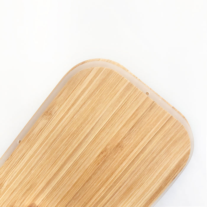 Detail view of Eco Beige bamboo lunch box lid with silicone insert for leak proof design.