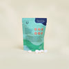 Huppy Natural toothpaste peppermint tablet refill made with clean ingredients and compostable packaging bag. 