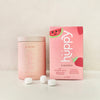 Huppy natural toothpaste tablets watermelon strawberry flavour inside pink Huppy aluminum container.