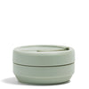 Sage color Stojo cup in 16oz. Collapsed side view. White background.
